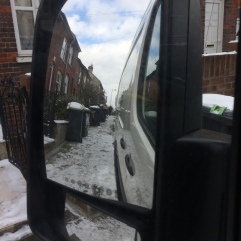 Leaving Luton, rear view mirror